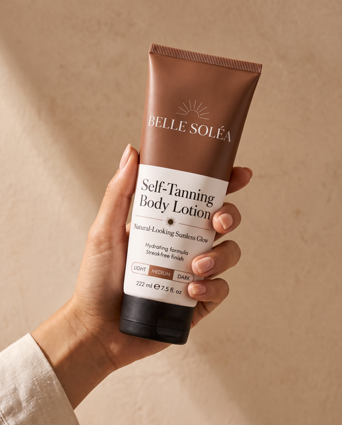 Hand holding Belle Soléa Self-Tanning Body Lotion